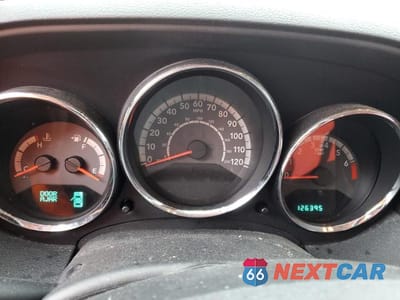 Zdjęcie 9 z 12 samochodu: 2010 DODGE CALIBER MAINSTREET VIN:1B3CB3HA9AD566398 - miniatura