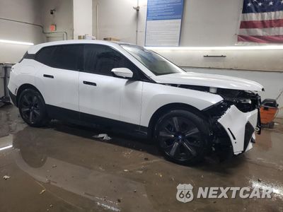 Czwarte zdjęcie samochodu z boku: 2025 BMW IX XDRIVE50 VIN:WB523CF07SCT08532 - miniatura