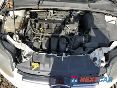 Zdjęcie 12 z 13 samochodu: 2013 FORD FOCUS TITANIUM VIN:1FADP3J25DL259382 - miniatura
