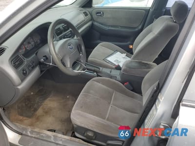 Zdjęcie 7 z 12 samochodu: 2002 MAZDA 626 LX VIN:1YVGF22C125296145 - miniatura