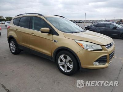 Czwarte zdjęcie samochodu z boku: 2014 FORD ESCAPE SE VIN:1FMCU9G93EUD77461 - miniatura