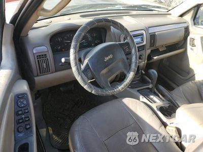 Zdjęcie 8 z 12 samochodu: 2004 JEEP GRAND CHEROKEE LAREDO VIN:1J4GX48S64C165105 - miniatura