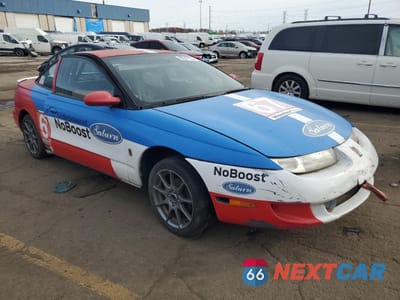 Czwarte zdjęcie samochodu z boku: 1999 SATURN SC2 VIN:1G8ZR1270XZ271458 - miniatura