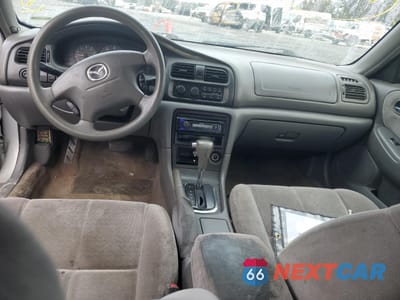 Zdjęcie 8 z 12 samochodu: 2002 MAZDA 626 LX VIN:1YVGF22C125296145 - miniatura