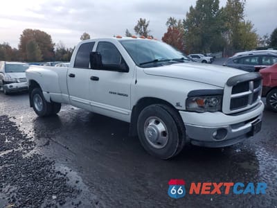 Czwarte zdjęcie samochodu z boku: 2003 DODGE RAM 3500 ST VIN:3D7MA48C13G807461 - miniatura