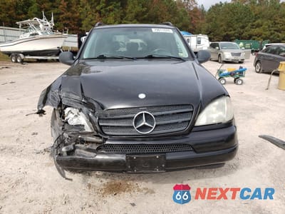 Piąte zdjęcie samochodu w środku: 1999 MERCEDES-BENZ ML 430 VIN:4JGAB72E2XA060295 - miniatura
