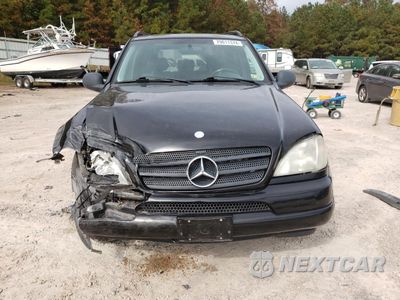 Piąte zdjęcie samochodu w środku: 1999 MERCEDES-BENZ ML 430 VIN:4JGAB72E2XA060295 - miniatura
