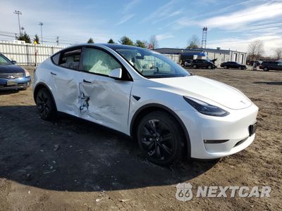 Czwarte zdjęcie samochodu z boku: 2024 TESLA MODEL Y VIN:7SAYGAEE5RF064240 - miniatura