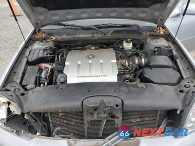 Zdjęcie 11 z 12 samochodu: 2004 CADILLAC DEVILLE VIN:1G6KD54Y04U242119 - miniatura