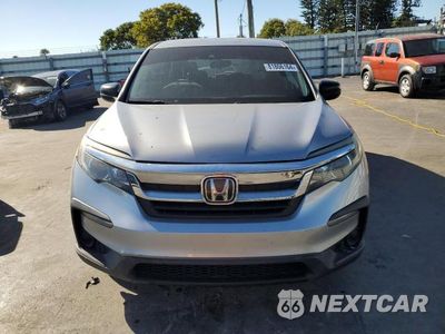 Piąte zdjęcie samochodu w środku: 2019 HONDA PILOT LX VIN:5FNYF5H16KB033410 - miniatura