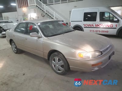 Czwarte zdjęcie samochodu z boku: 1996 TOYOTA CAMRY LE VIN:JT2BF12KXT0133258 - miniatura