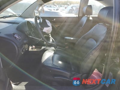 Zdjęcie 7 z 13 samochodu: 2010 VOLKSWAGEN NEW BEETLE VIN:3VWPW3AG5AM011646 - miniatura