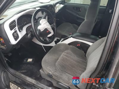 Zdjęcie 7 z 14 samochodu: 2002 GMC SONOMA VIN:1GTCS19W828229163 - miniatura
