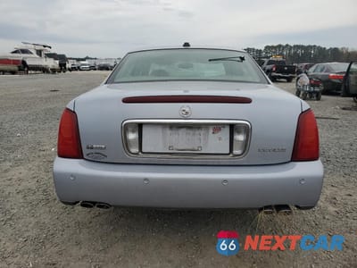 Zdjęcie 6 z 12 samochodu: 2004 CADILLAC DEVILLE VIN:1G6KD54Y04U242119 - miniatura
