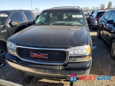 Piąte zdjęcie samochodu w środku: 2002 GMC YUKON XL K1500 VIN:1GKFK16Z42J161291 - miniatura