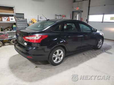 Trzecie zdjęcie samochodu z tyłu: 2014 FORD FOCUS SE VIN:1FADP3F26EL305098 - miniatura
