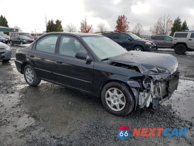 Czwarte zdjęcie samochodu z boku: 2002 KIA SPECTRA BASE VIN:KNAFB121225171948 - miniatura