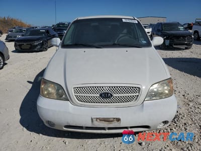 Piąte zdjęcie samochodu w środku: 2004 KIA SEDONA EX VIN:KNDUP131946548637 - miniatura