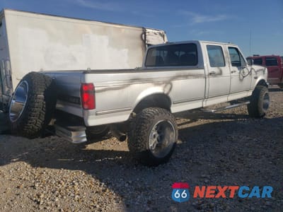 Trzecie zdjęcie samochodu z tyłu: 1994 FORD F350 VIN:1FTJW35K0REA05715 - miniatura