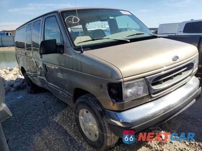 Czwarte zdjęcie samochodu z boku: 1999 FORD ECONOLINE E350 SUPER DUTY WAGON VIN:1FBNE31S9XHB82919 - miniatura