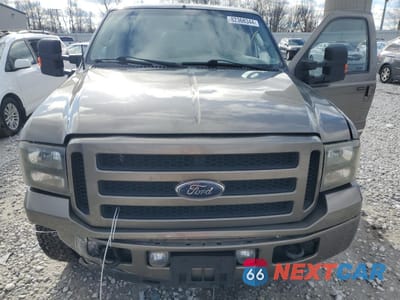 Zdjęcie 14 z 15 samochodu: 2004 FORD EXCURSION LIMITED VIN:1FMSU43P74EB12117 - miniatura