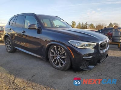 Czwarte zdjęcie samochodu z boku: 2023 BMW X5 XDRIVE45E VIN:5UXTA6C03P9N95925 - miniatura