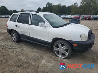 Czwarte zdjęcie samochodu z boku: 2003 HYUNDAI SANTA FE GLS VIN:KM8SC13DX3U565255 - miniatura