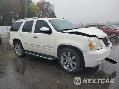 Czwarte zdjęcie samochodu z boku: 2013 GMC YUKON DENALI HYBRID VIN:1GKS2GEJ1DR295239 - miniatura