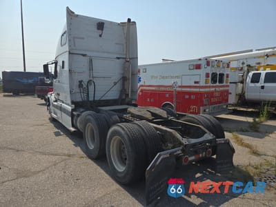 Trzecie zdjęcie samochodu z tyłu: 2005 VOLVO VN VNL VIN:4V4NC9TG35N371713 - miniatura