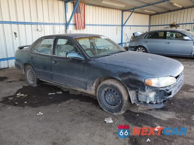 Czwarte zdjęcie samochodu z boku: 1996 TOYOTA CAMRY DX VIN:JT2BG12KXT0370457 - miniatura