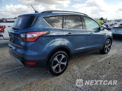 Trzecie zdjęcie samochodu z tyłu: 2018 FORD ESCAPE SEL VIN:1FMCU0HD1JUB05256 - miniatura