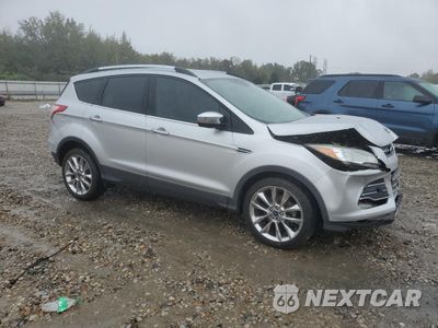 Czwarte zdjęcie samochodu z boku: 2016 FORD ESCAPE SE VIN:1FMCU0GX3GUA18009 - miniatura