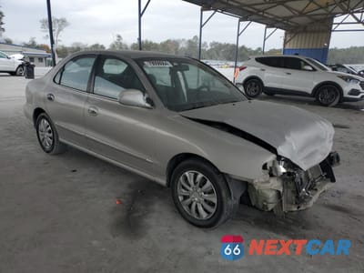 Czwarte zdjęcie samochodu z boku: 2000 HYUNDAI ELANTRA GLS VIN:KMHJF35F5YU001615 - miniatura