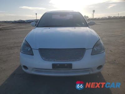 Piąte zdjęcie samochodu w środku: 2003 NISSAN ALTIMA BASE VIN:1N4AL11D93C276964 - miniatura