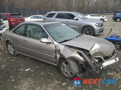 Czwarte zdjęcie samochodu z boku: 1999 ACURA 2.3CL VIN:19UYA3251XL008645 - miniatura