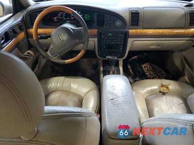 Zdjęcie 8 z 12 samochodu: 2002 LINCOLN CONTINENTAL VIN:1LNHM97V72Y659531 - miniatura