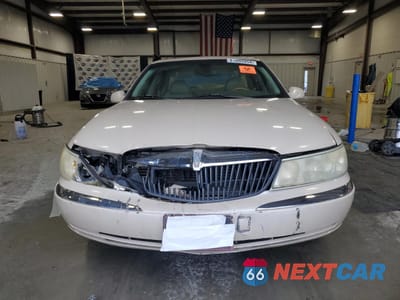 Piąte zdjęcie samochodu w środku: 2002 LINCOLN CONTINENTAL VIN:1LNHM97V72Y659531 - miniatura