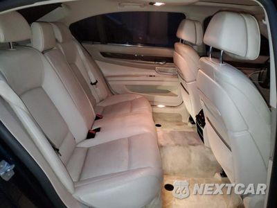 Zdjęcie 10 z 12 samochodu: 2014 BMW 750 LXI VIN:WBAYF8C5XED653780 - miniatura
