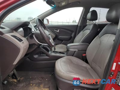 Zdjęcie 7 z 13 samochodu: 2011 HYUNDAI TUCSON GLS VIN:KM8JU3AC6BU209866 - miniatura