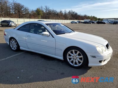 Czwarte zdjęcie samochodu z boku: 2001 MERCEDES-BENZ CL 500 VIN:WDBPJ75J71A015174 - miniatura