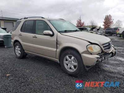 Czwarte zdjęcie samochodu z boku: 2005 MERCEDES-BENZ ML 500 VIN:4JGAB75E95A539368 - miniatura