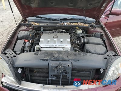 Zdjęcie 13 z 14 samochodu: 2002 CADILLAC DEVILLE VIN:1G6KD57Y72U259850 - miniatura