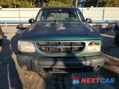 Piąte zdjęcie samochodu w środku: 1999 FORD EXPLORER VIN:1FMYU22X7XUA21018 - miniatura