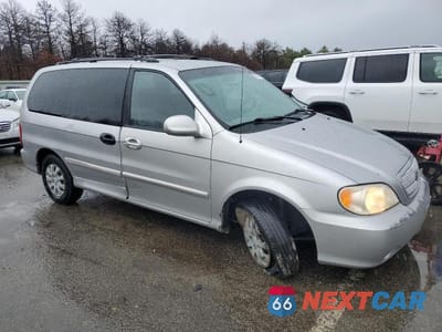 Czwarte zdjęcie samochodu z boku: 2005 KIA SEDONA EX VIN:KNDUP132X56664939 - miniatura