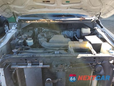 Zdjęcie 12 z 13 samochodu: 2013 NISSAN NV 1500 VIN:1N6BF0KY2DN102447 - miniatura