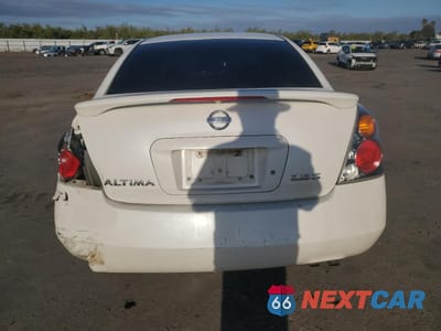 Zdjęcie 6 z 14 samochodu: 2003 NISSAN ALTIMA BASE VIN:1N4AL11D93C276964 - miniatura