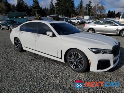 Czwarte zdjęcie samochodu z boku: 2022 BMW 750 XI VIN:WBA7U2C03NCH40559 - miniatura