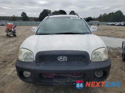 Piąte zdjęcie samochodu w środku: 2003 HYUNDAI SANTA FE GLS VIN:KM8SC13DX3U565255 - miniatura