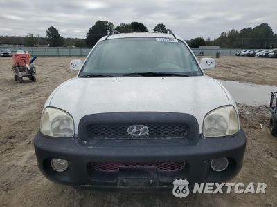 Piąte zdjęcie samochodu w środku: 2003 HYUNDAI SANTA FE GLS VIN:KM8SC13DX3U565255 - miniatura