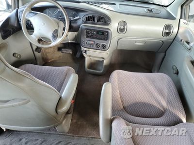 Zdjęcie 8 z 15 samochodu: 1999 PLYMOUTH VOYAGER VIN:2P4GP25G2XR467976 - miniatura